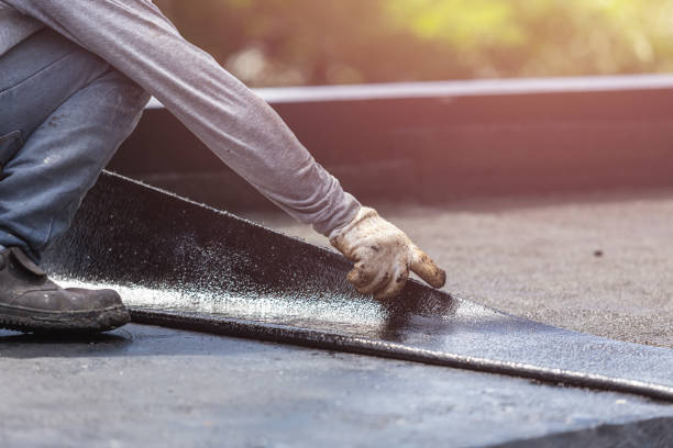 Professional Waterproofing technician working in Abingdon, IL